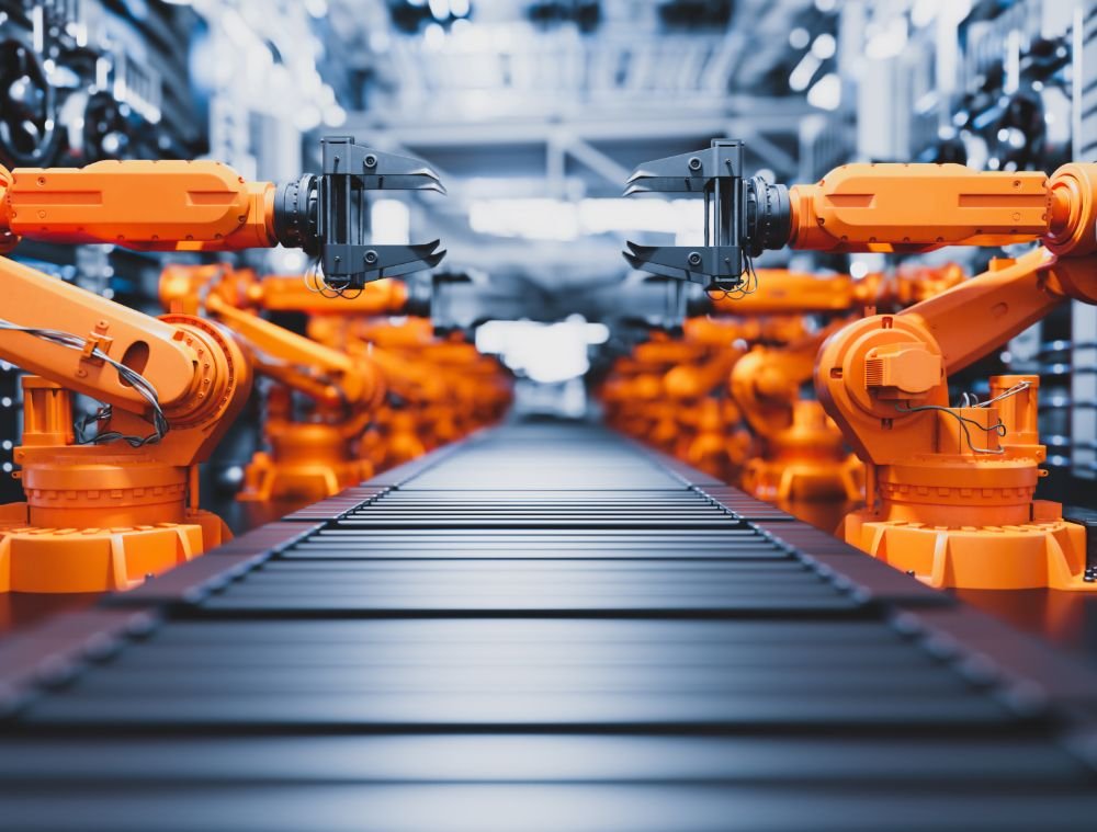 robotic arms along assembly line in modern factory x4a22zu